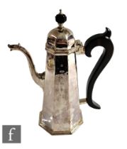 A hallmarked silver Queen Anne style coffee pot of plain octagonal form, weight 35.5oz, height 28cm,