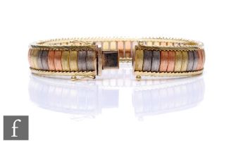 A 14ct tri coloured gold bracelet comprising alternating white, rose and yellow gold pairs of