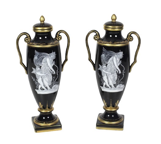 An attractive pair of 19th Century tall two handled French porcelain Vases, with lids, each with