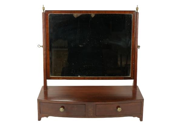 A George III period bow front mahogany Dressing Table Mirror, with two frieze drawers and
