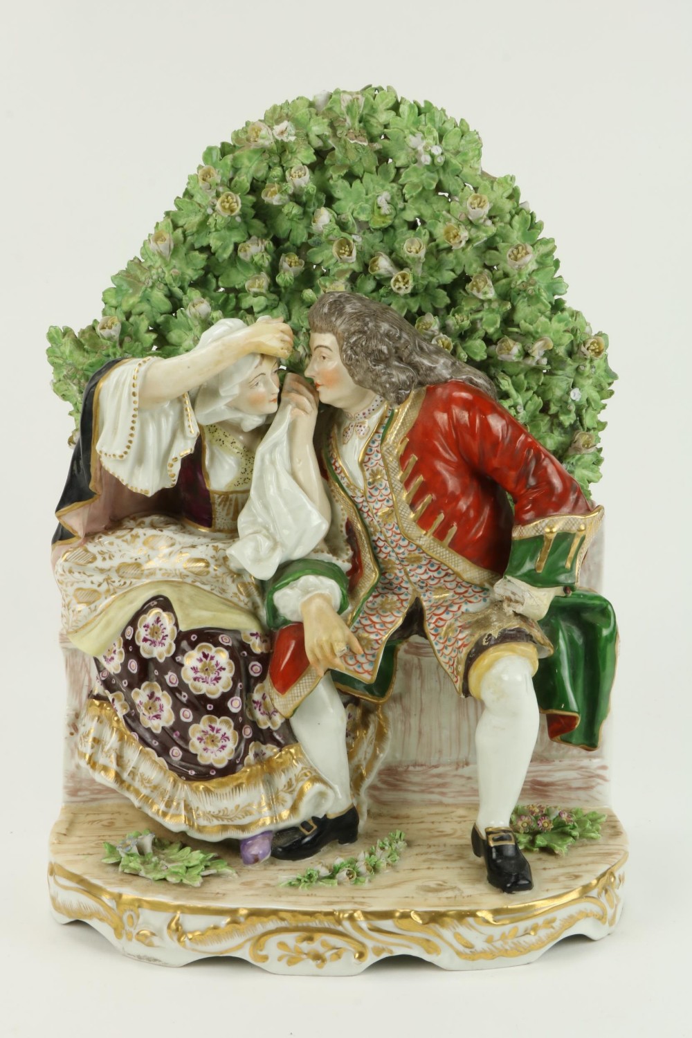 A large and attractive 19th Century porcelain Group, Gentleman & Lady seated on a bench with heavy - Image 2 of 7