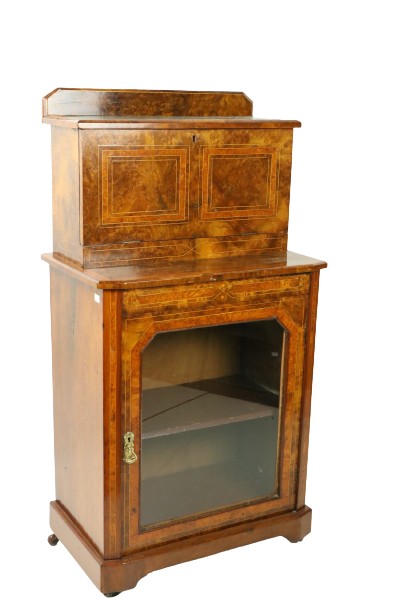 A Victorian inlaid and crossbanded walnut Secretaire Cabinet, the leather inset top above a drop