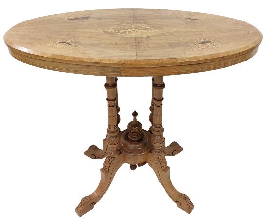 A small oval Victorian walnut and marquetry Loo Table, on four turned stems and quadruple pod,