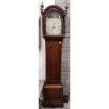 A late 18th / early 19th Century oak cased dome top Grandfather Clock, the arched glazed door