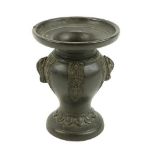 An attractive small early 19th Century Chinese bronze Vase, approx. 10cms (4'') high, with decorated