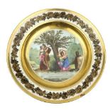 An attractive hand painted Continental Dish, 'L'Origine de la Coquettere,' 23 cms diameter. (1)