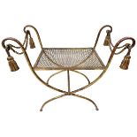 An unusual gilt wrought iron X framed Stool, with ropes and tassels and scrolls ends, 28 1/2'' (