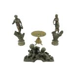 A pair of Spelter Figures, 'L'Agriculture' 18'' (46cms), together with a brass Table Centre, on four