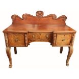 An attractive 19th Century mahogany Sideboard, the gallery back with central carved pineapple
