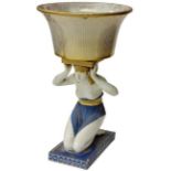 A late 19th Century Continental Egyptian Revival figural Jardiniere, decorated with blue and gilt