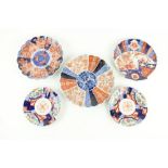 A pair of Japanese Imari porcelain Plates,ÿ8 1/2'' (22cms), a similar larger shell shaped ditto,