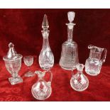 A collection of approx. 7 cutglass Pieces, including a tall vase, decanters, jugs, etc., as a lot,