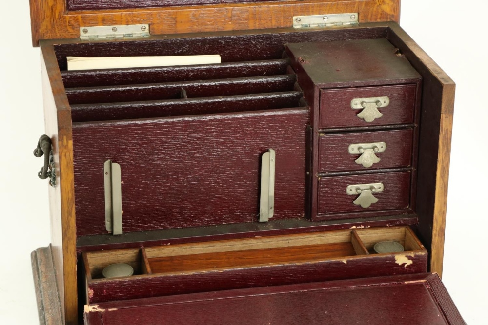 An Edwardian oak Table Desk, the lift top and pull down front revealing a fitted interior with - Image 3 of 5