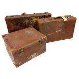 Two similar antique leather Suitcases, (labels of travel locations and hotels) together with a