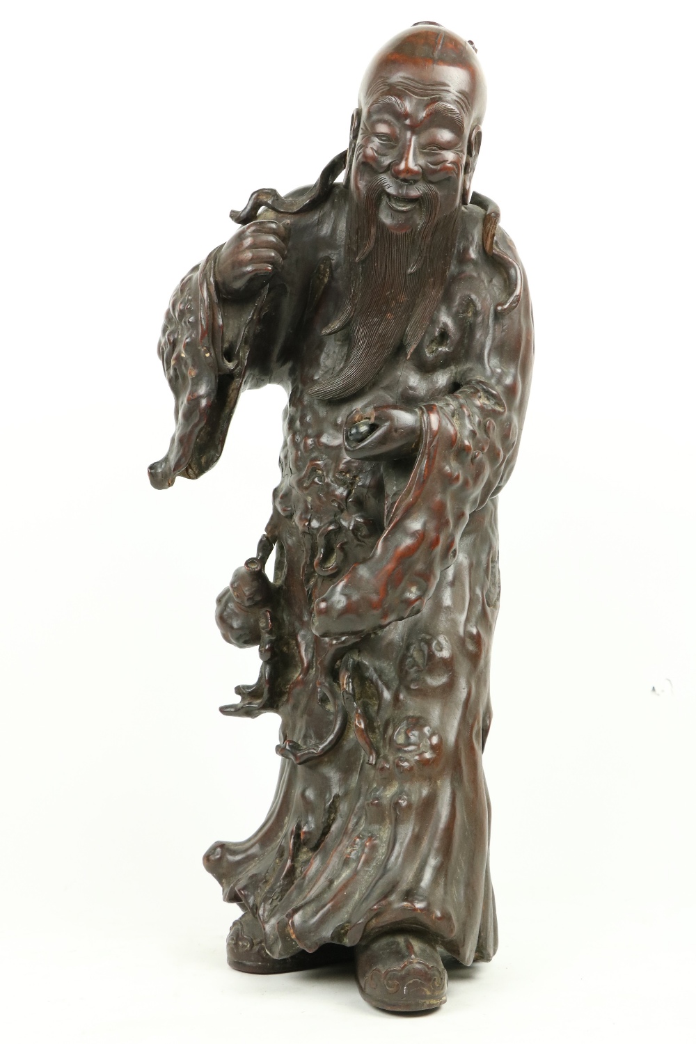 A fine Chinese carved rootwood Figure, of an Immortal 22'' (56cms). (1)