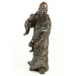 A fine Chinese carved rootwood Figure, of an Immortal 22'' (56cms). (1)