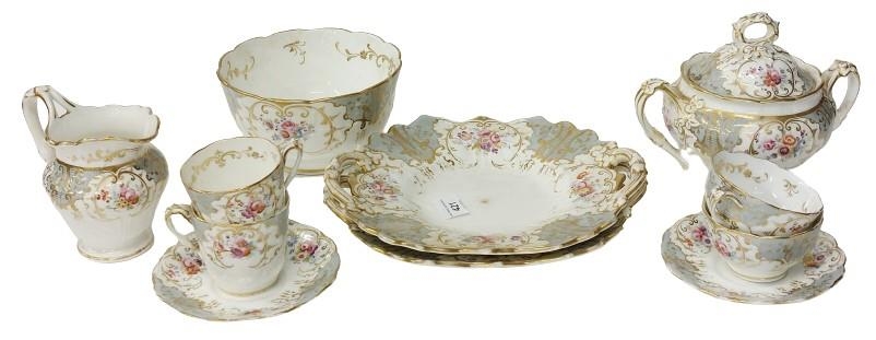 An attractive floral decorated and gilt highlighted part Tea Service, comprises cups and saucers,