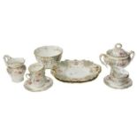 An attractive floral decorated and gilt highlighted part Tea Service, comprises cups and saucers,