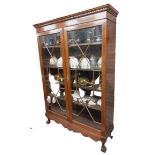 A Chippendale style mahogany Display Cabinet, with dentil moulded cornice above two astragal