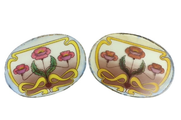 A pair of very attractive Art Nouveau oval stained glass Door Panels, each decorated with flowers,