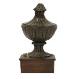 An 18th Century carved Finial, with leaf design, 41cms (16'') high, as is. (1)