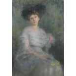 In the Manner of Philip de Laszlo (1869 - 1937) 'Portrait of an elegant Lady seated, possibly a