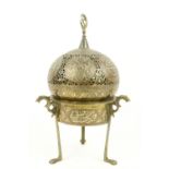 A late 19th Century Islamic brass, copper and silver Incense Burner, with pierced dome cover with