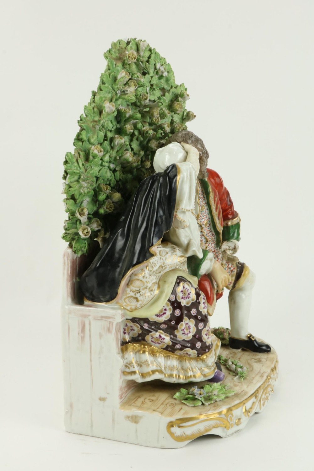 A large and attractive 19th Century porcelain Group, Gentleman & Lady seated on a bench with heavy - Image 5 of 7