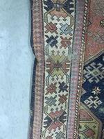 A fine quality antique Carpet / woollen Runner, the central dark blue ground panel with eight - Image 8 of 9