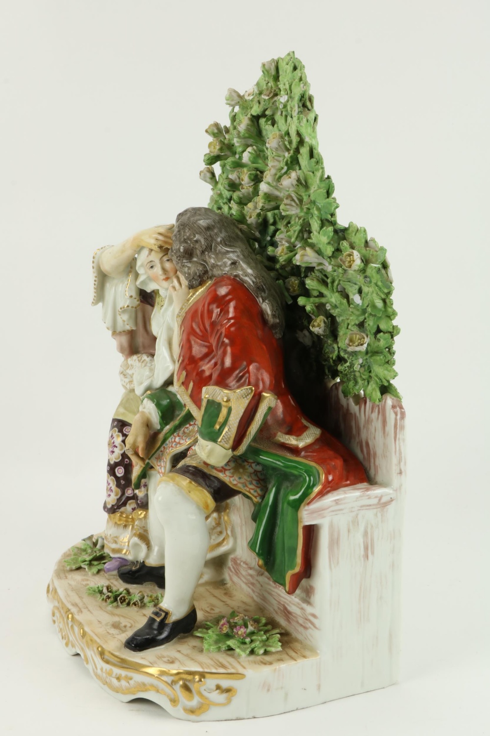 A large and attractive 19th Century porcelain Group, Gentleman & Lady seated on a bench with heavy - Image 4 of 7