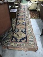 A fine quality antique Carpet / woollen Runner, the central dark blue ground panel with eight - Image 2 of 9
