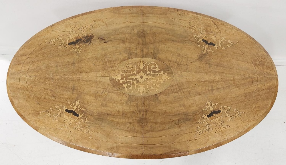 A small oval Victorian walnut and marquetry Loo Table, on four turned stems and quadruple pod, - Image 3 of 3