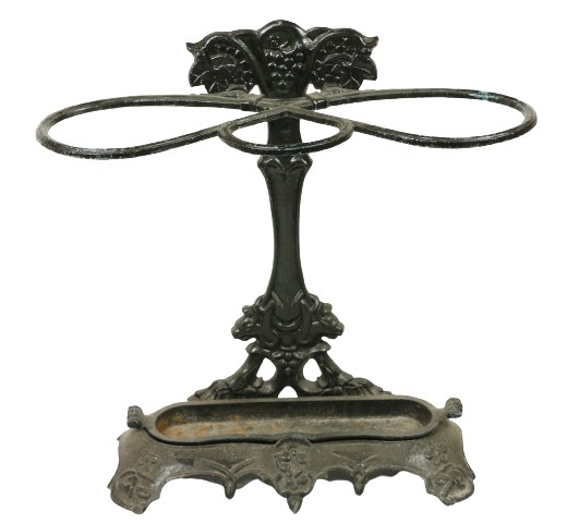 A Victorian cast iron Stick and Umbrella Stand, decorated with grapes and vine leaves on shaped