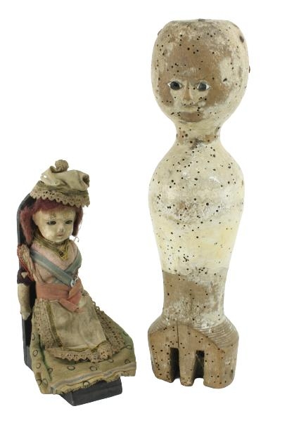 A Queen Anne period carved and painted wooden Dolls Body, the head with coloured glass eyes, (
