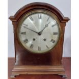 A 19th Century mahogany cased domed top Bracket Clock, the moulded top over circular silver dial