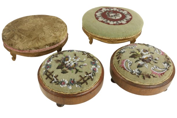 A pair of small French serpentine shaped upholstered Footstools, each on four cabriole legs, 13'' (