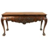 A good quality 19th Century Irish mahogany Side Table, the plain top with gadroon edge over a shaped