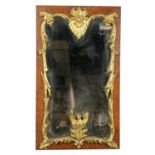 A parcel gilt and birds-eye-maple Wall Mirror, crested with a stylized leaf cartouche issuing leaf