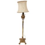 A telescopic brass Standard Oil Lamp, the brass reservoir on an adjustable reeded stem with