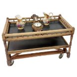 A rectangular two tier oak Industrial Food Trolley, with top gallery on turned supports, 112cms (