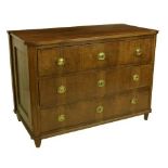 A 19th Century Continental mahogany and walnut Chest of drawers, with canted corners, the three