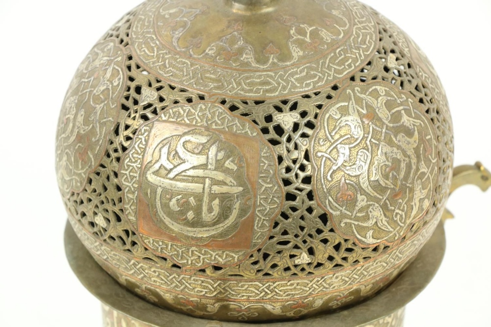 A late 19th Century Islamic brass, copper and silver Incense Burner, with pierced dome cover with - Image 2 of 9