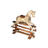 A 19th Century painted Hobby Horse, with leather saddle on pine stand, 97cms x 102cms (38" x