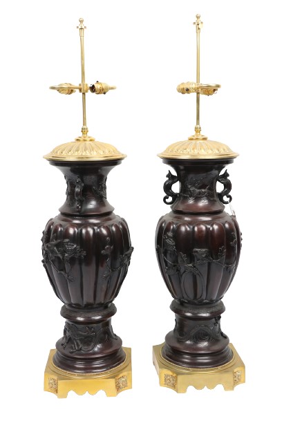 A fine pair of early 20th Century Meji period Japanese bronze and brass mounted vase shaped Table