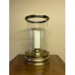 A large cylindricalÿbrass and glass Candle Lantern, approx. 50cms (19 1/2") h; together with a