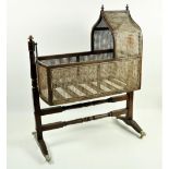 A good 19th Century Gothic style mahogany Child's Rocking Cradle,ÿwith caned panels under an