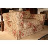 A good pair of floral covered two seater Settees, each with cushion back and seat, 155cms (61"). (2)