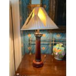 A mahogany and bronze mounted Corinthian style Table Lamp, with cream pleated shade on octagonal