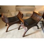 A pair of mahogany X framed Stools, with slatted sides, 61cms wide (24"). (2)