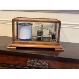A good oak cased Barograph, with five glass panels, 35cms (14"). (1)
